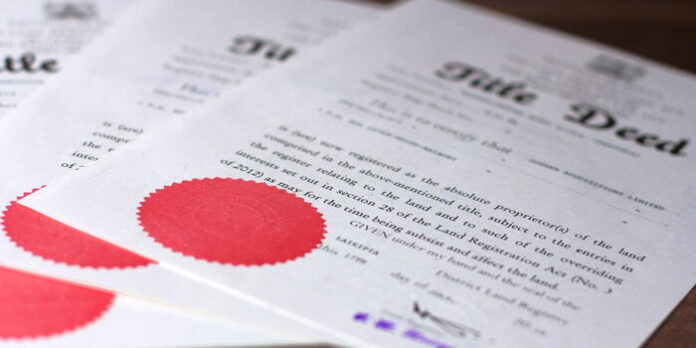 a sample of title deeds at a real estate firm