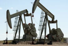 Oil falls nearly 2% as investors assess Russia sanctions, OPEC+ output plans