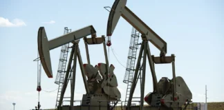Oil falls nearly 2% as investors assess Russia sanctions, OPEC+ output plans