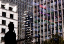 Stocks fall as megacaps weigh, yen weaker after BOJ announcement