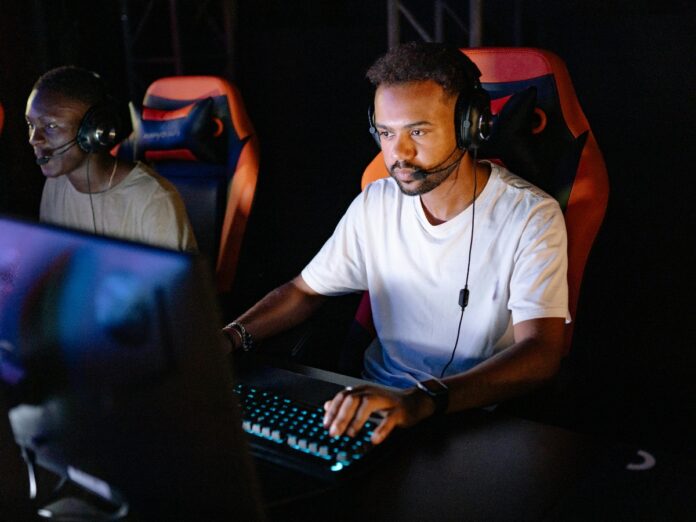 Photo by Yan Krukau_ https___www.pexels.com_photo_photo-of-a-man-in-a-white-shirt-playing-on-a-computer-9072282_