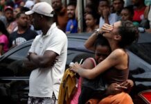 Corpses line Rio street, pushing death toll from police raids to 132
