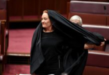 Australian Senator Suspended from Parliament for Wearing a Burqa in Protest
