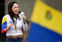 Venezuela Threatens to Brand Opposition Leader a Fugitive Over Nobel Prize