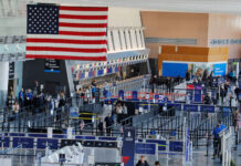 U.S. Warns of Possible 20% Flight Cuts as Shutdown Grounds Thousands of Travelers