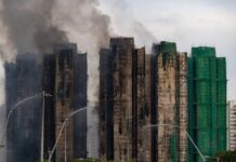 Hong Kong Fire Death Toll Reaches 55; Blaze Rages for Second Day