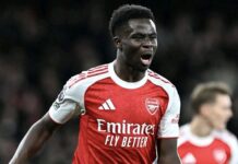 Arsenal Reclaim Premier League Summit with 2-0 Win over Brentford