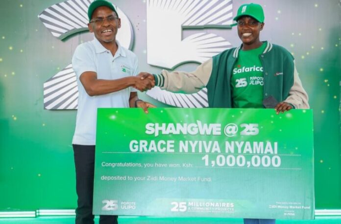 Safaricom-CEO-Peter-Ndegwa-left-presents-a-Ksh.-1-Million-cheque-to-Grace-Nyiva-Nyamai-759x500