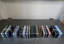 DCI recovers 62 stolen mobile phones destined for Ugandan market as suspect escapes