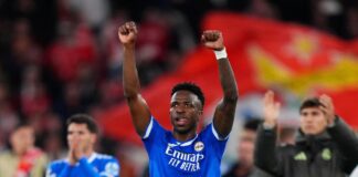 Real Madrid beat Benfica in a tie halted over Vinicius racism allegation