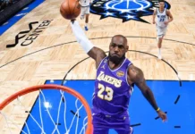 James sets NBA appearance record in late Lakers win