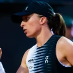 Swiatek drops just one game to set up Osaka meeting