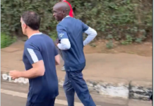 French President Emmanuel Macron goes for a morning run with Eliud Kipchoge on Nairobi streets